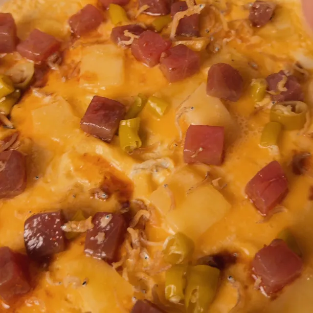 The ‘lazy’ tortilla up close, with diced bluefin tuna, piparra peppers and a crispy anchovy